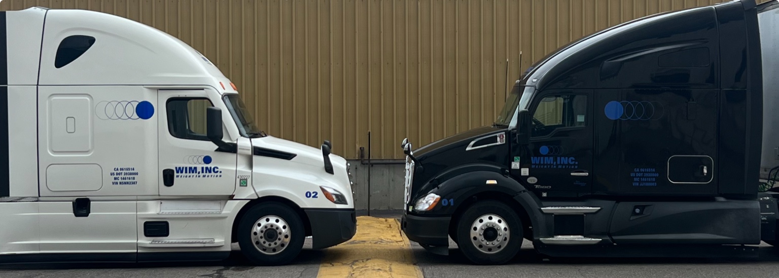 Two trucks nose to nose
